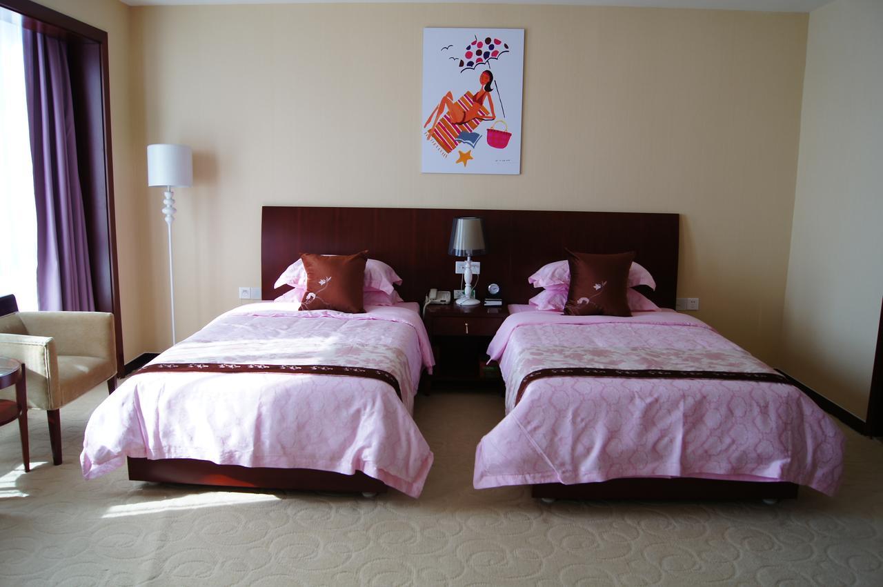 Fuxing Oriental Boutique Hotel Chifeng Habitación foto