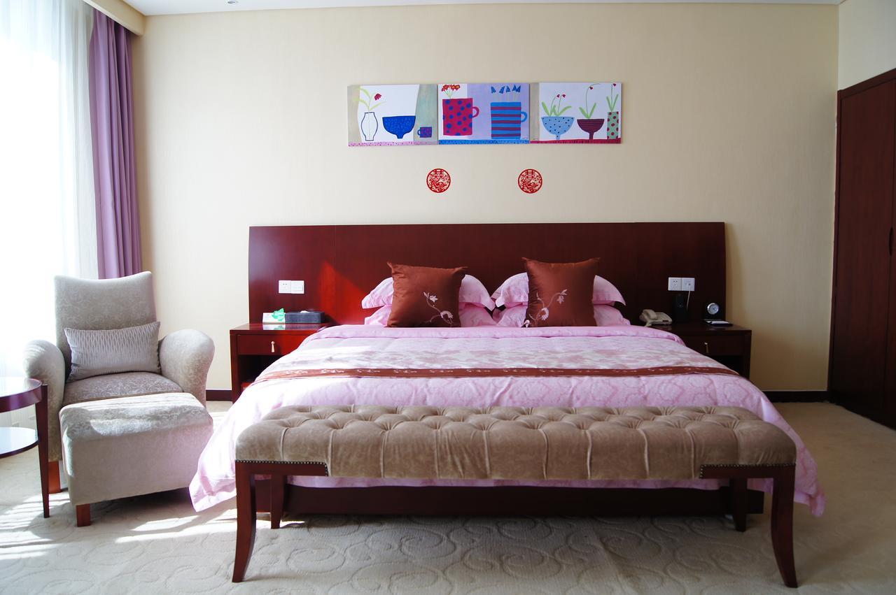 Fuxing Oriental Boutique Hotel Chifeng Habitación foto
