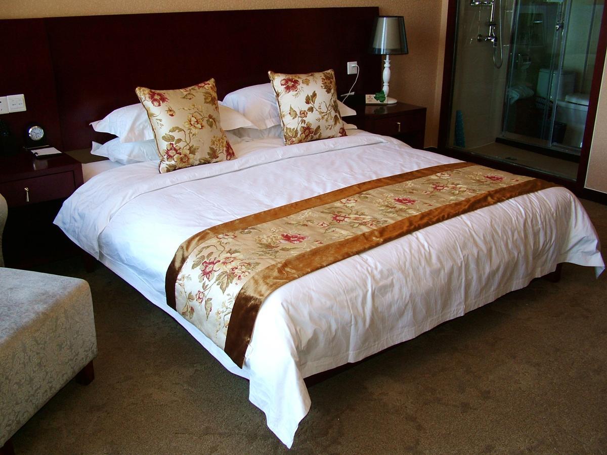 Fuxing Oriental Boutique Hotel Chifeng Habitación foto
