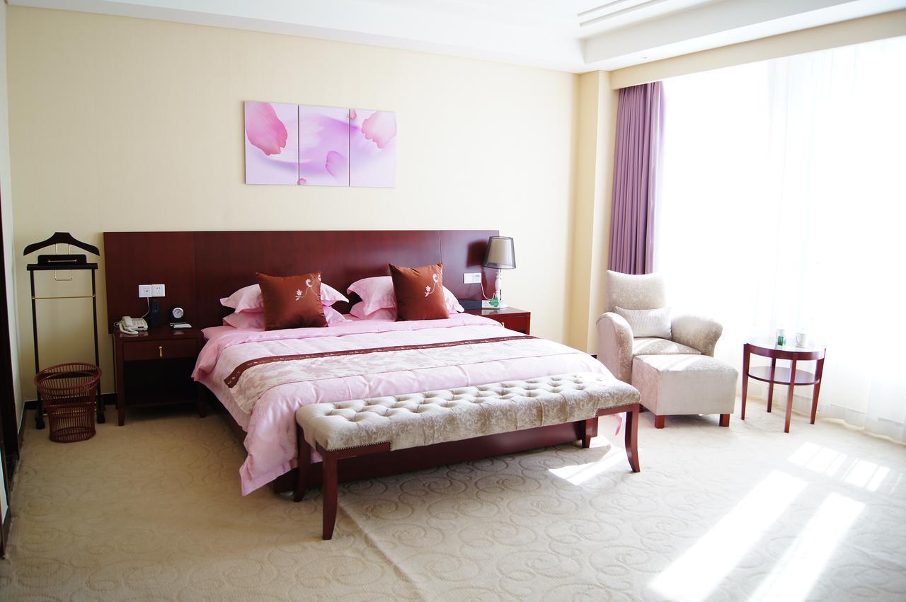 Fuxing Oriental Boutique Hotel Chifeng Habitación foto