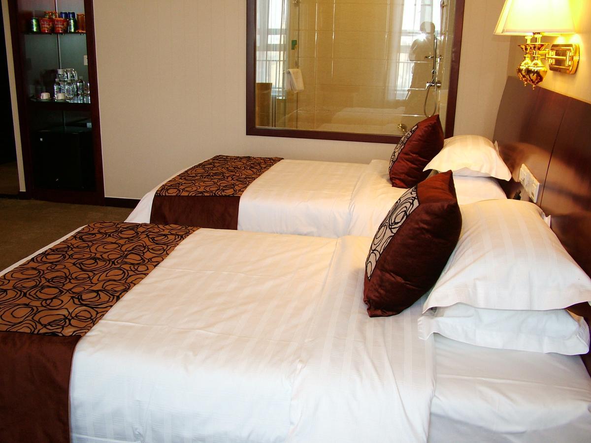 Fuxing Oriental Boutique Hotel Chifeng Habitación foto
