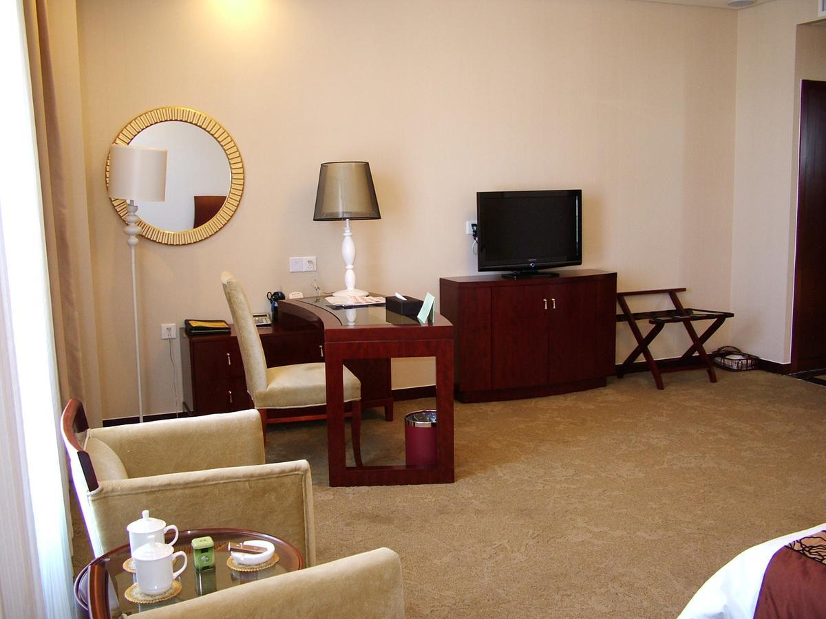 Fuxing Oriental Boutique Hotel Chifeng Habitación foto