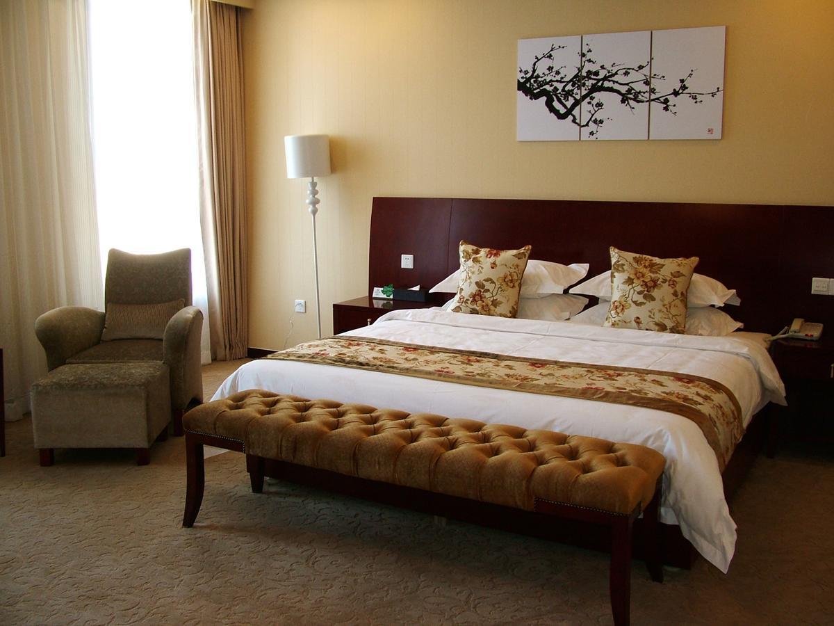 Fuxing Oriental Boutique Hotel Chifeng Habitación foto