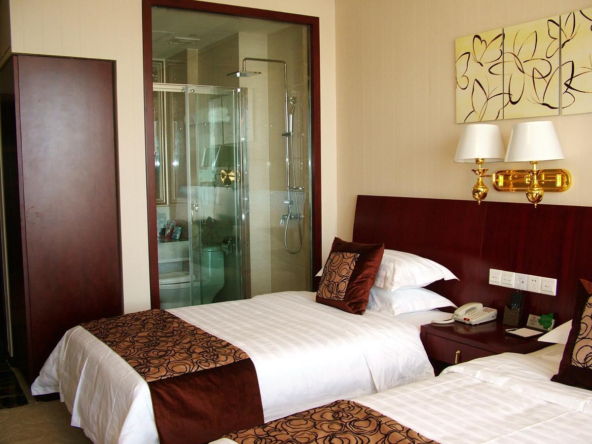 Fuxing Oriental Boutique Hotel Chifeng Habitación foto