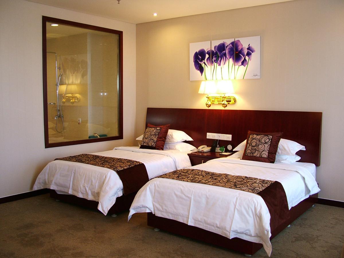 Fuxing Oriental Boutique Hotel Chifeng Habitación foto