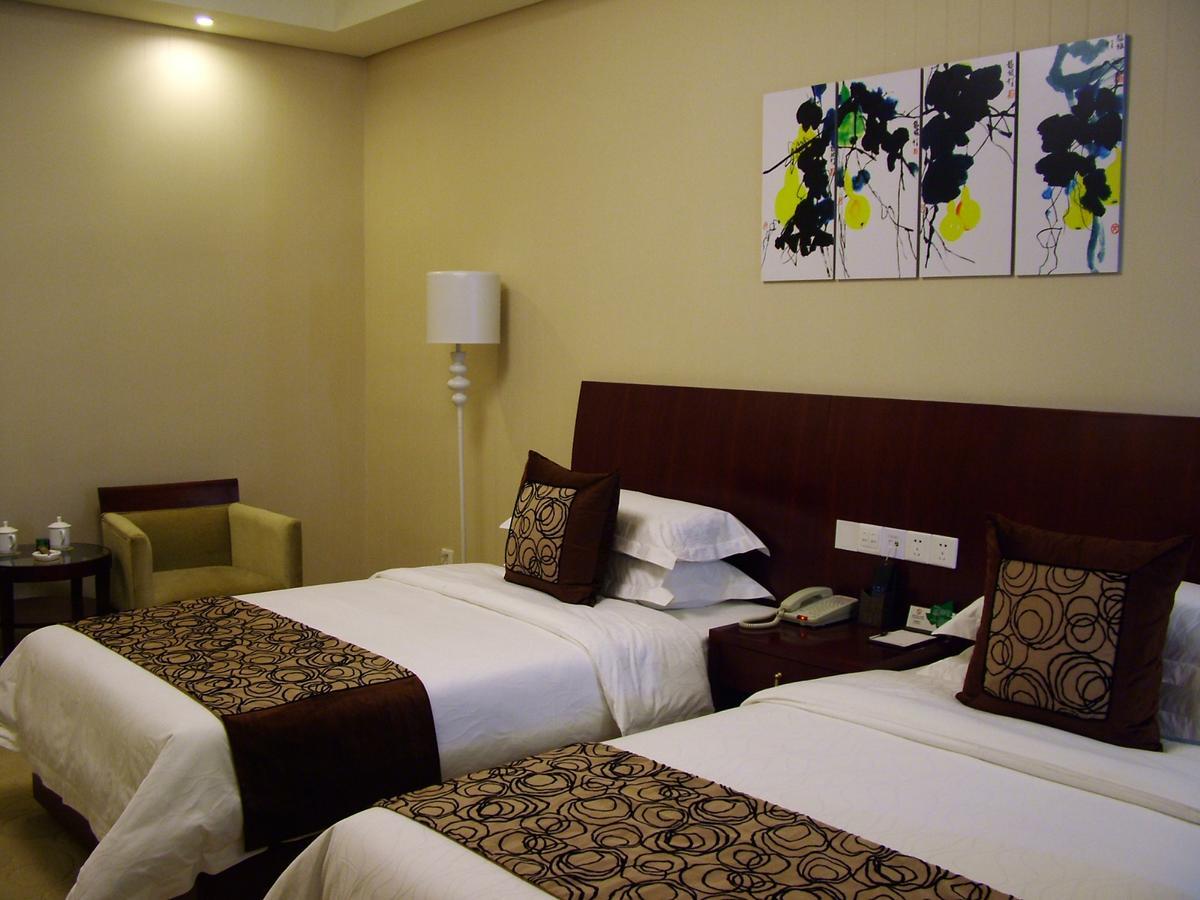 Fuxing Oriental Boutique Hotel Chifeng Habitación foto