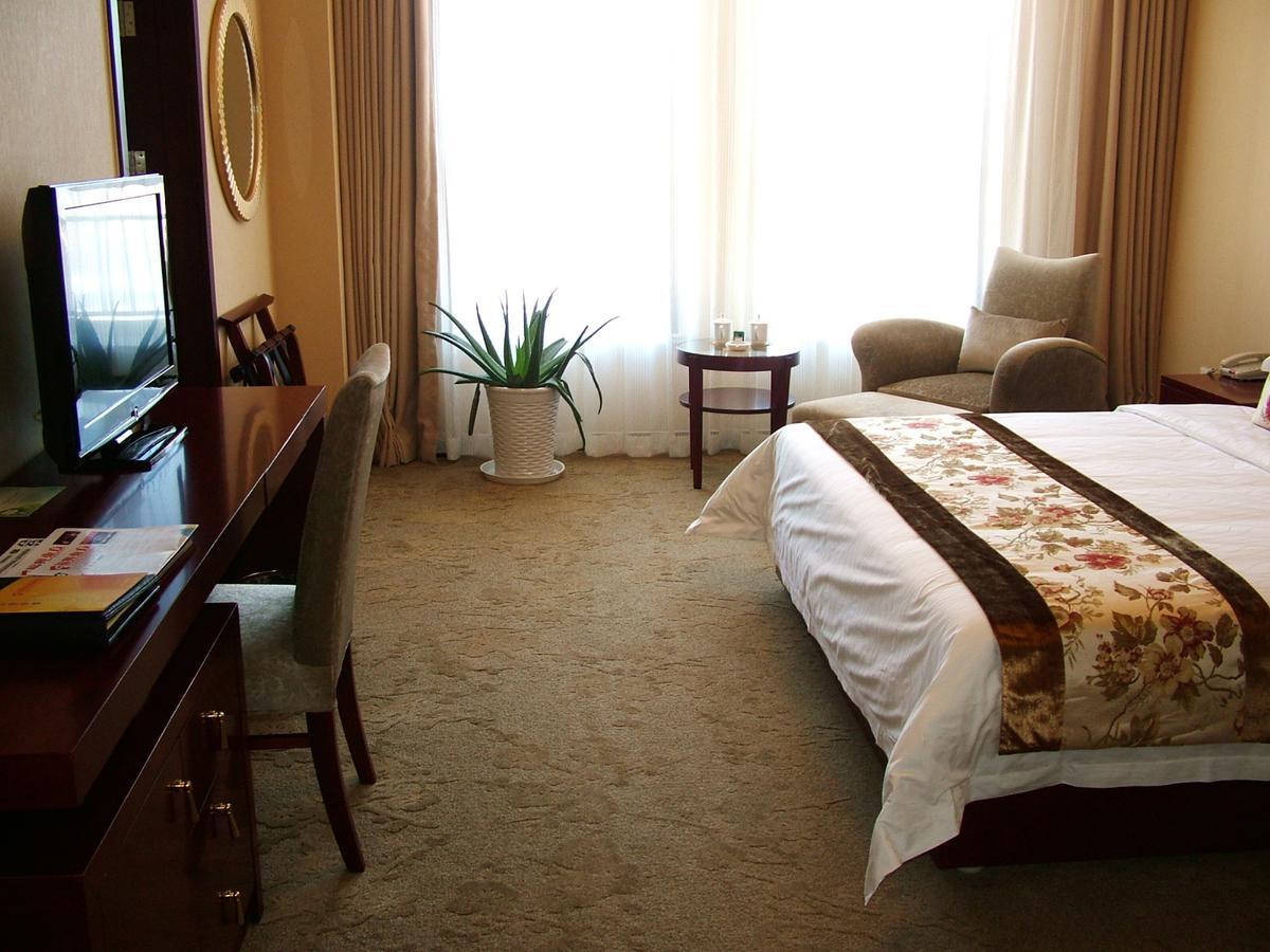 Fuxing Oriental Boutique Hotel Chifeng Habitación foto